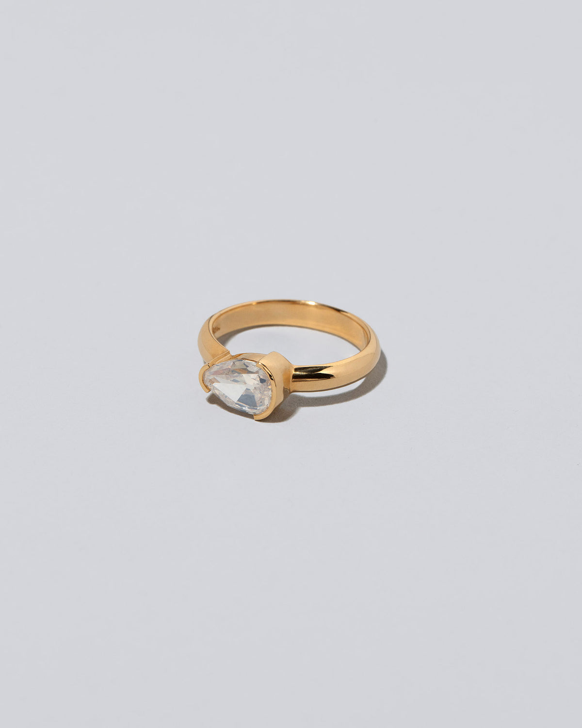 View from the side of the Effervescence Ring on light color background.