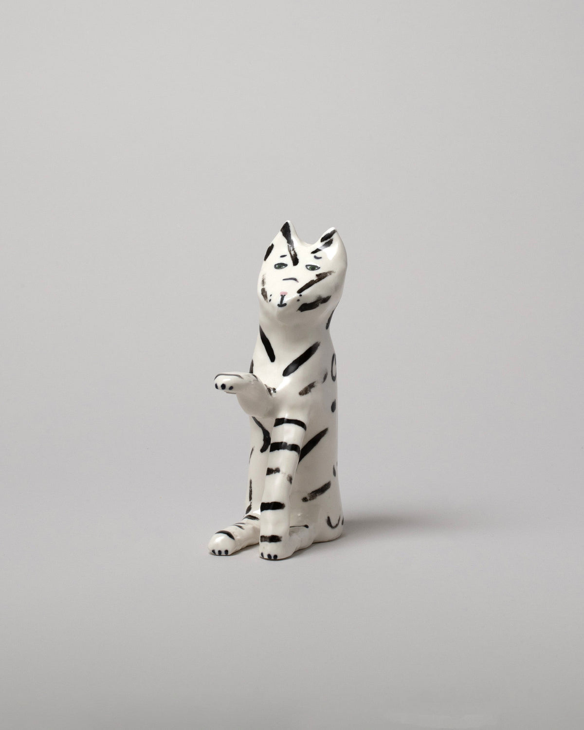 View from the side of the Eleonor Boström Black Key Cat on light color background.