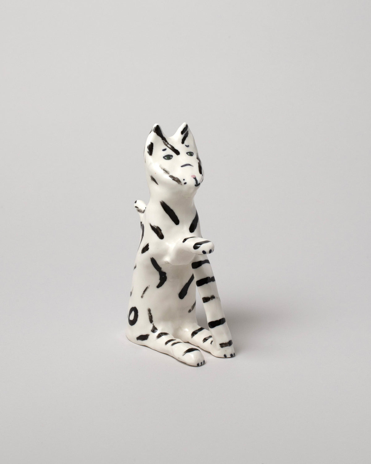 View from the side of the Eleonor Boström Black Key Cat on light color background.