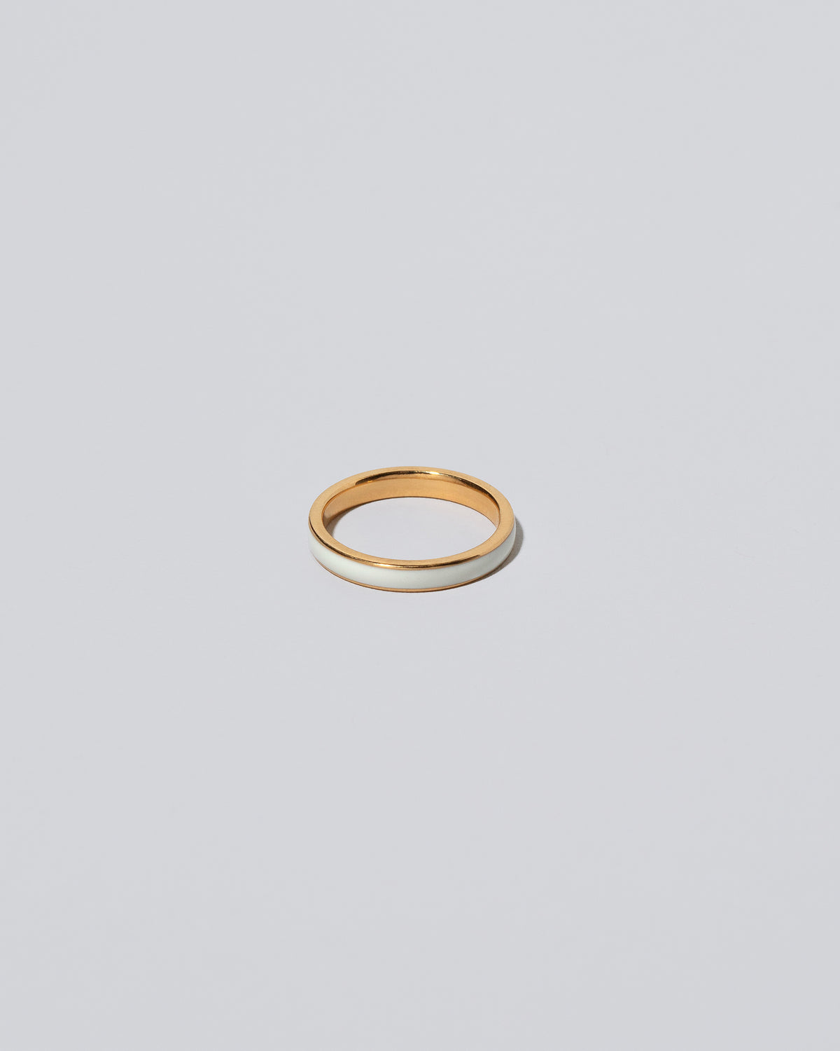 Enamel Band in White Out on light color background.