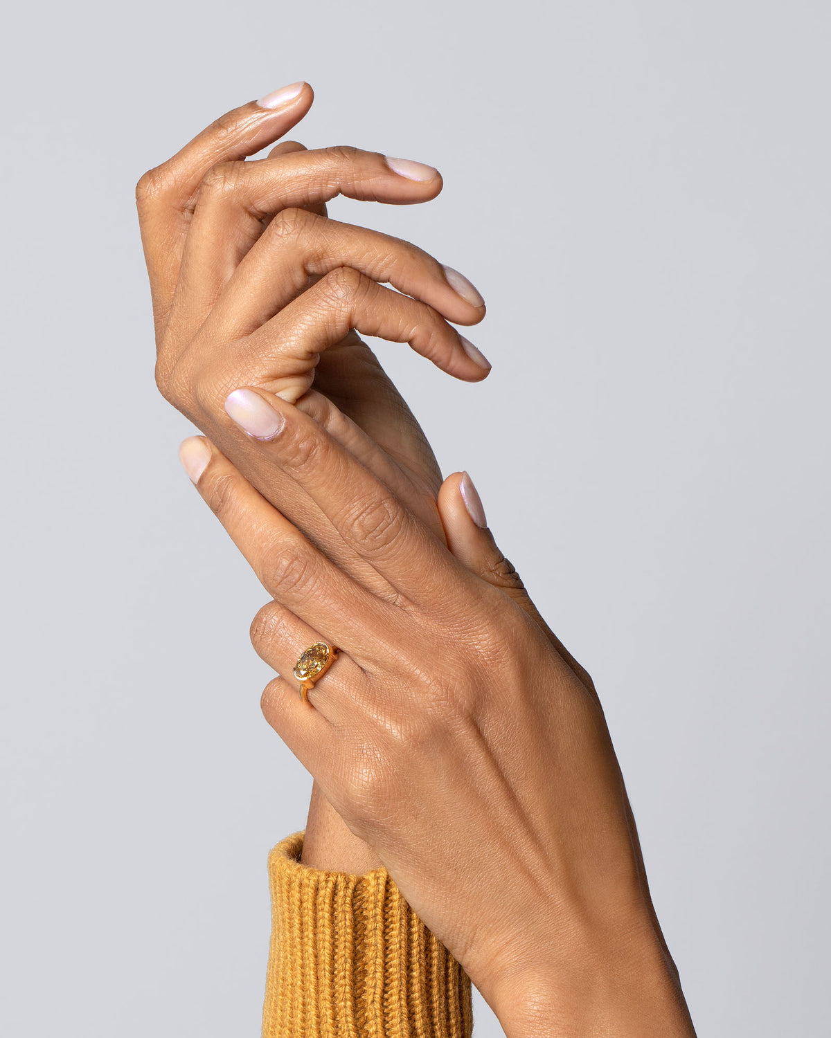 Exhilaration Ring on model.