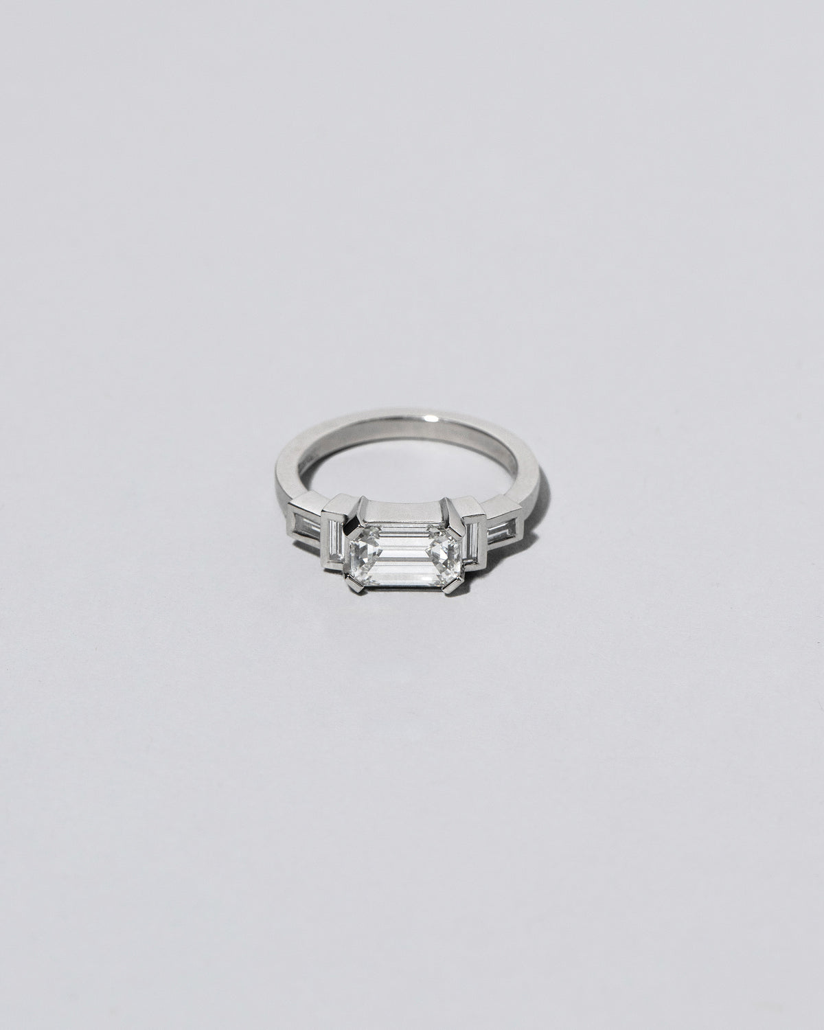 Platinum Diamond Expression Ring on light color background. Please note: This image represents a custom creation.