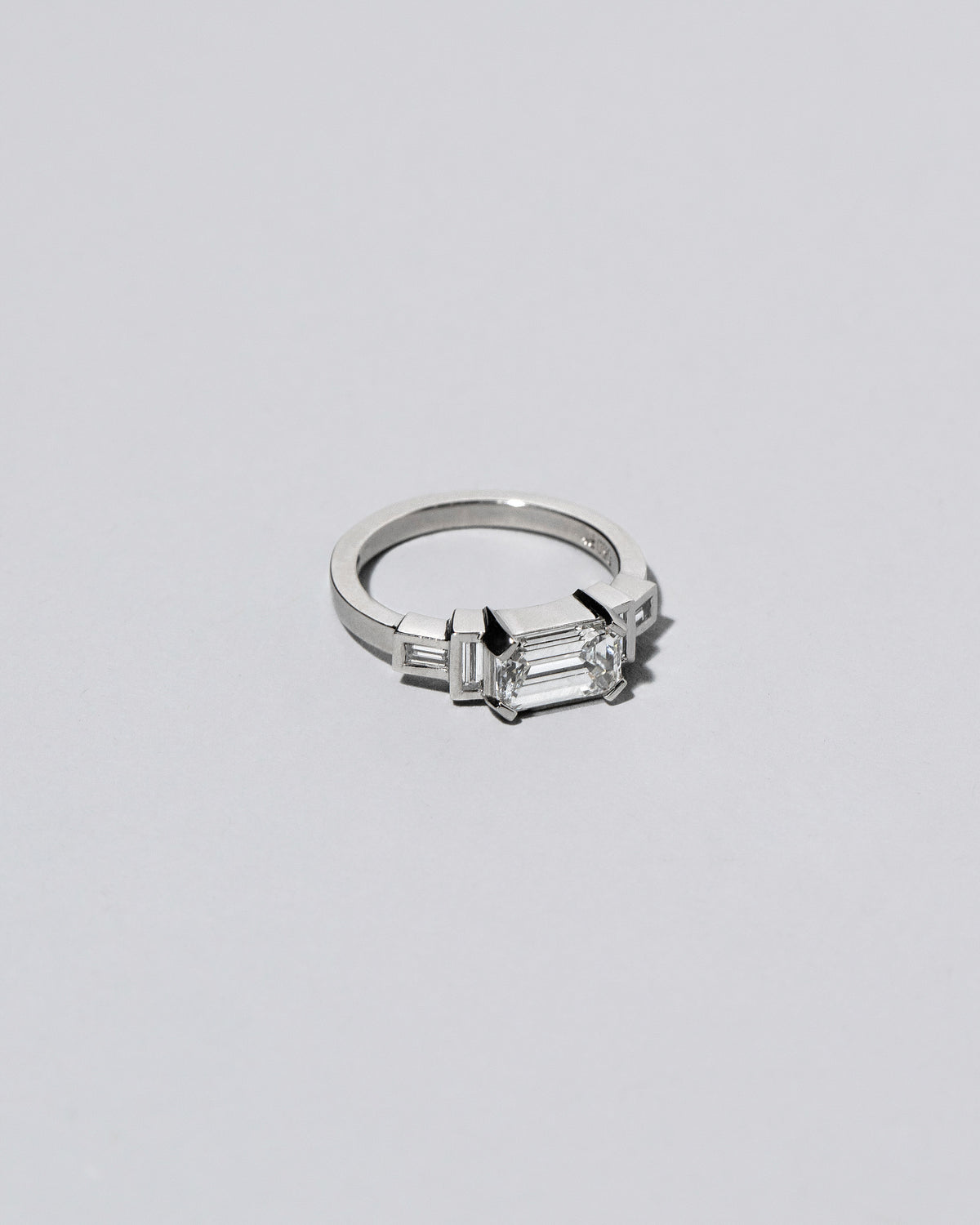 Platinum Diamond Expression Ring on light color background. Please note: This image represents a custom creation.