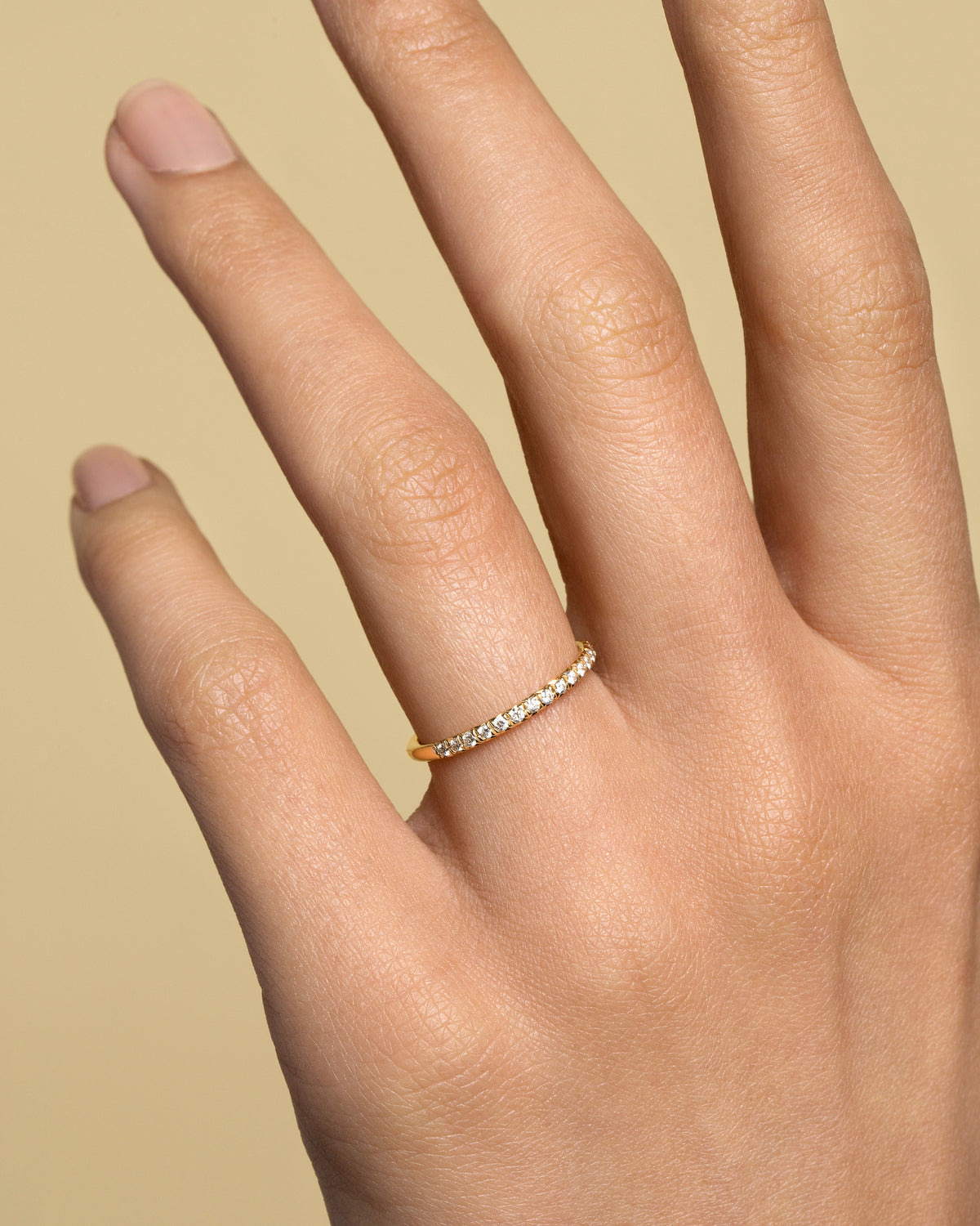 Gold White Diamond Fifteen Stone Dot Band on model.