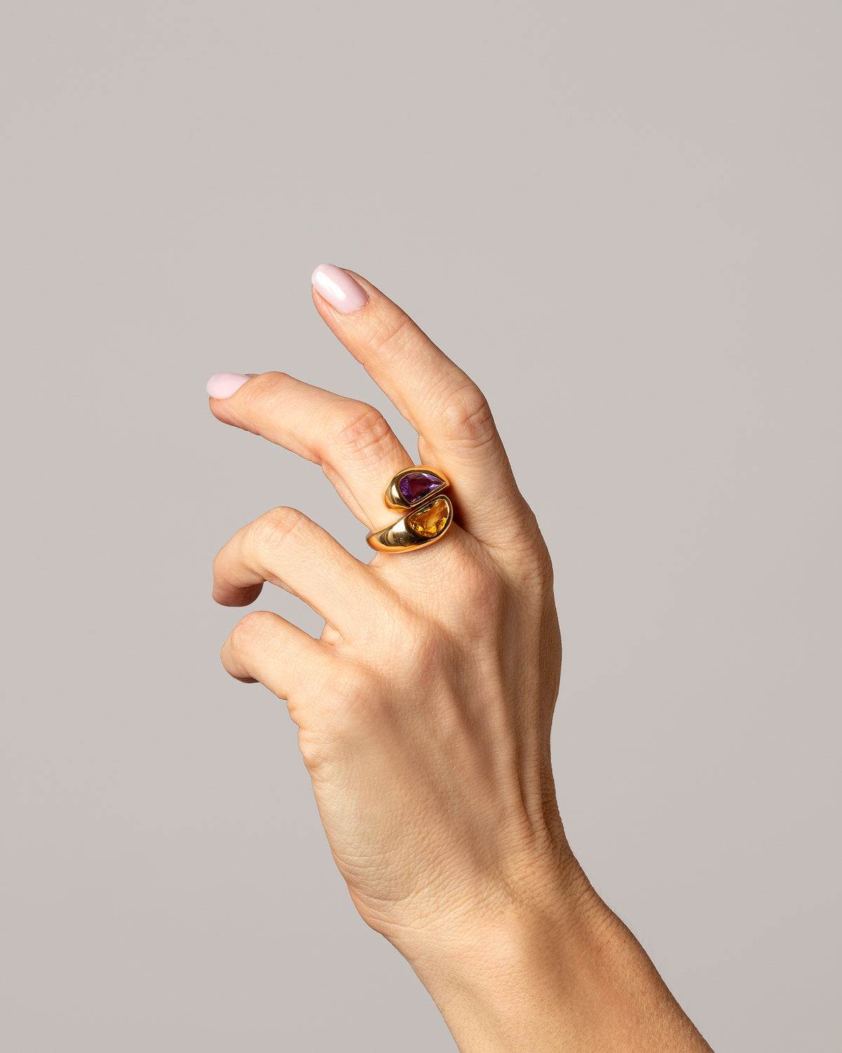 Styled image of model wearing the Mask Ring.