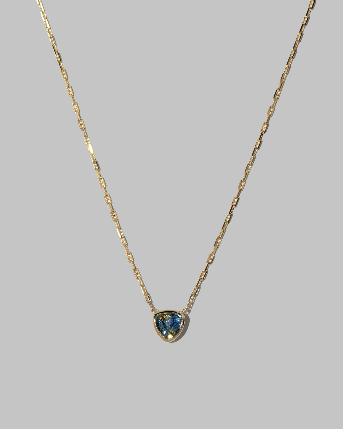 Closeup details of the Northern Lights Necklace 004 on light color background.