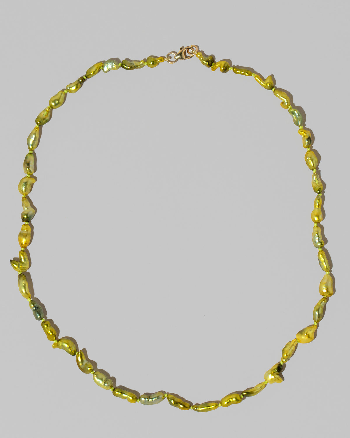 Ula Pearl Necklace 003 on light color background.