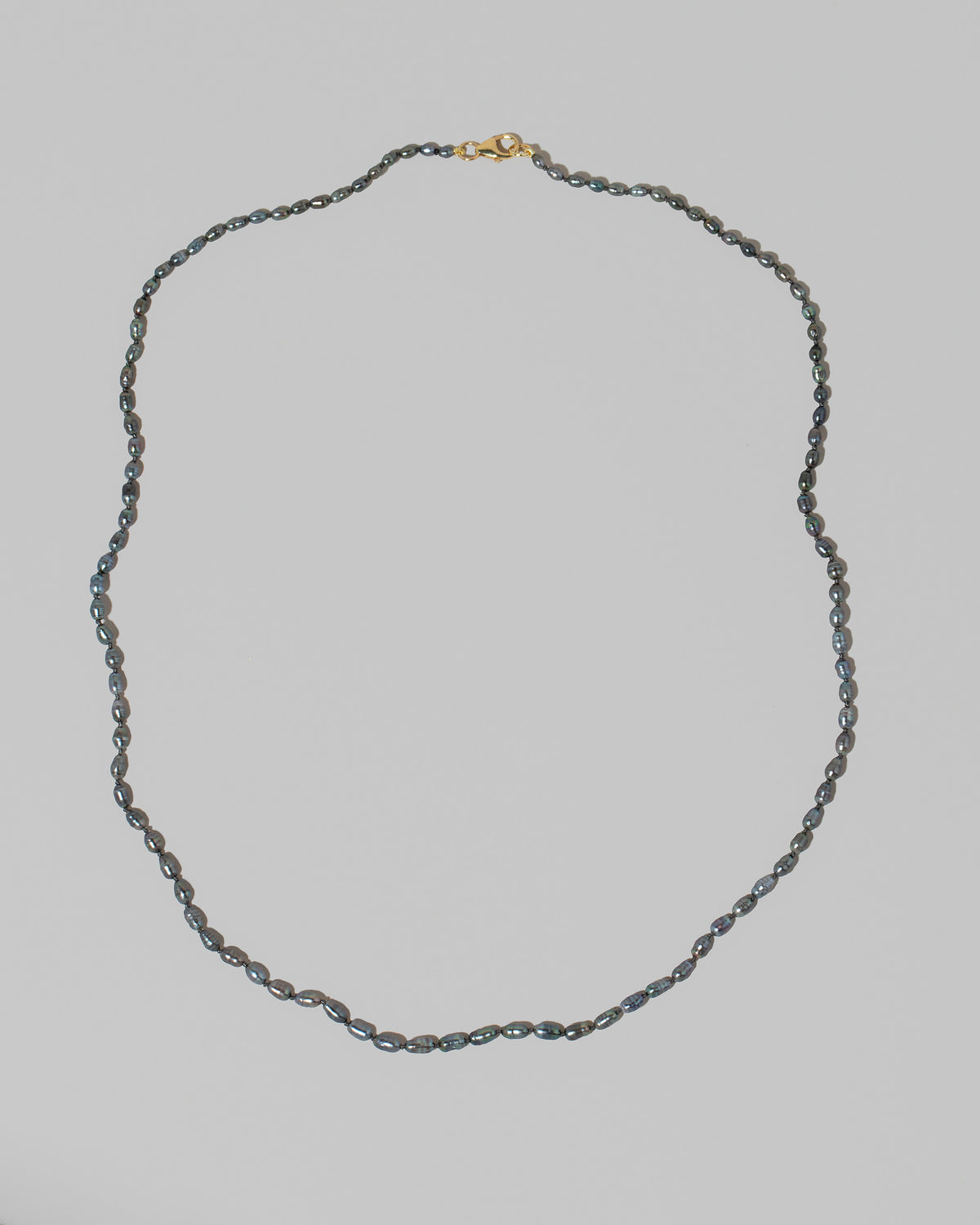 Ula Pearl Necklace 006 on light color background.