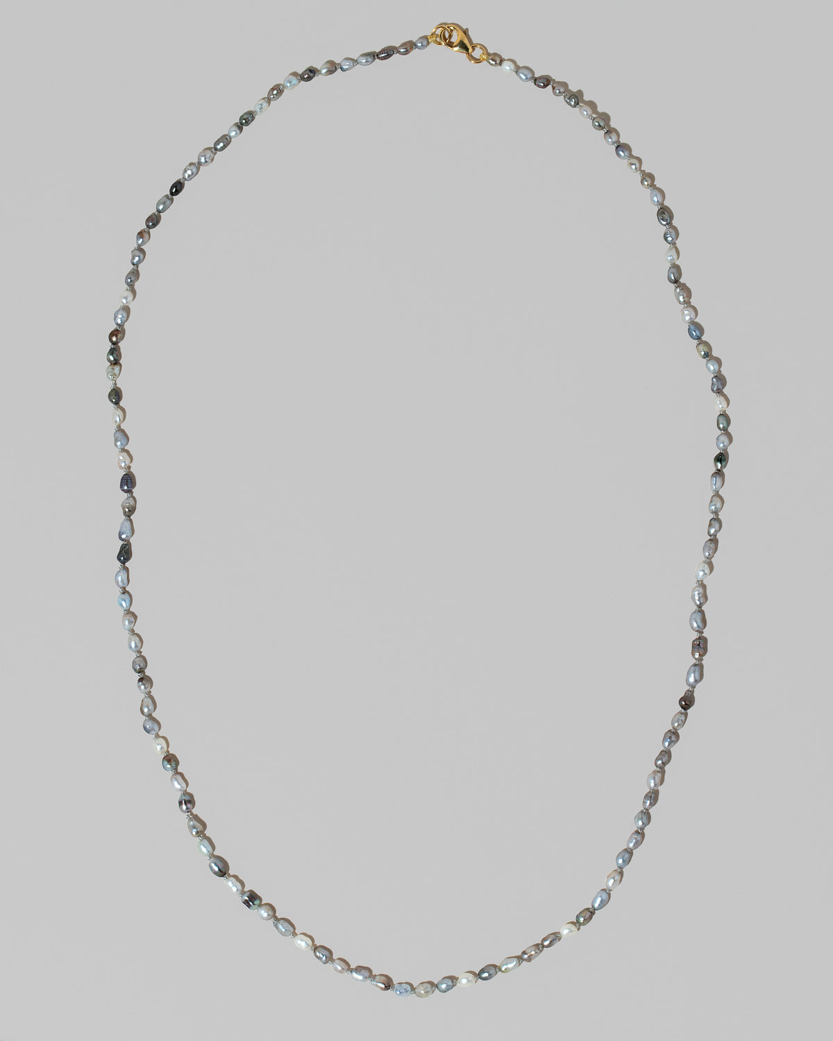 Ula Pearl Necklace 007 on light color background.