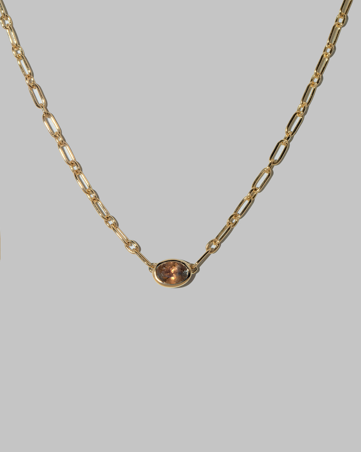 Closeup details of the Northern Lights Necklace 001 on light color background.