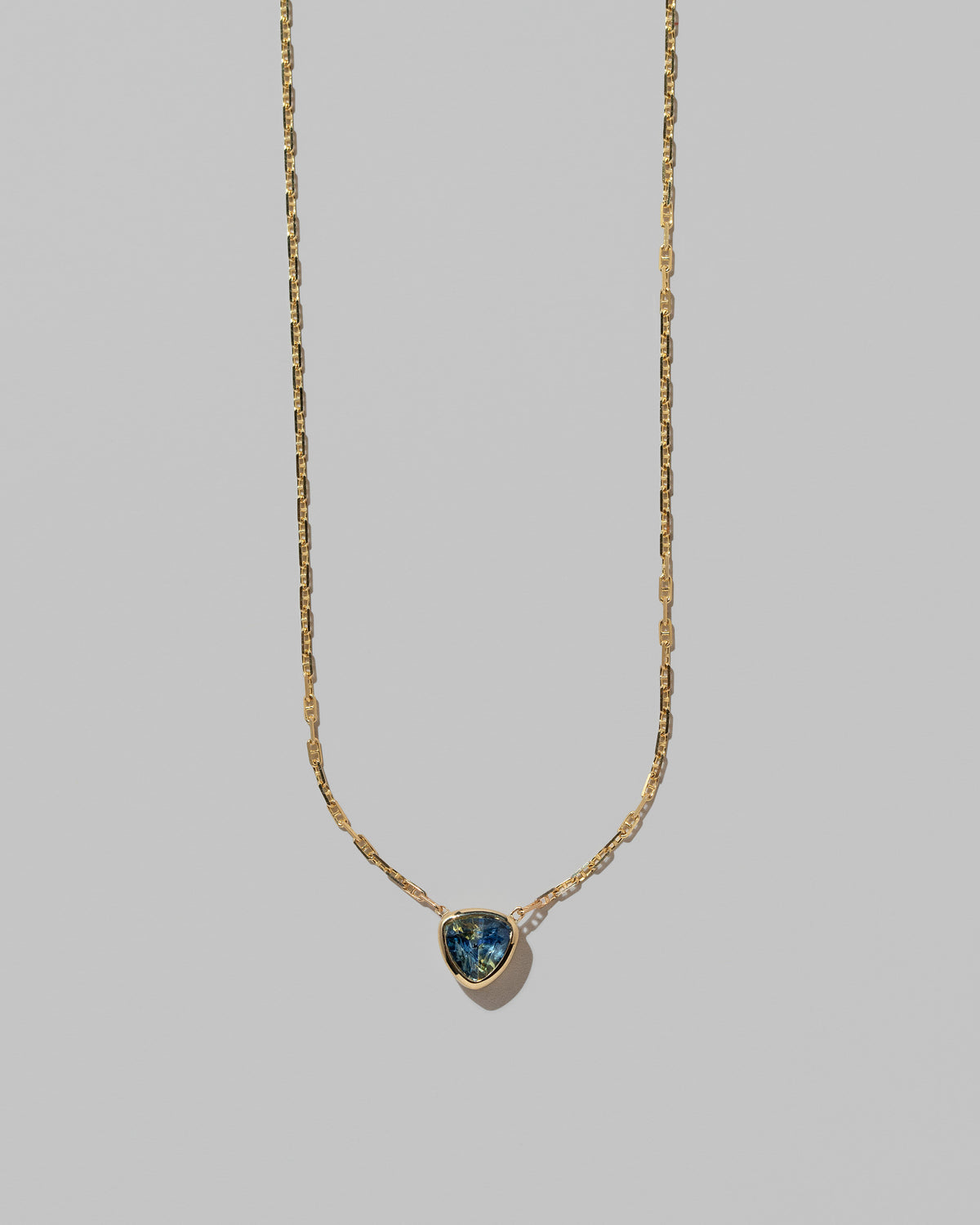 Closeup details of the Northern Lights Necklace 004 on light color background.