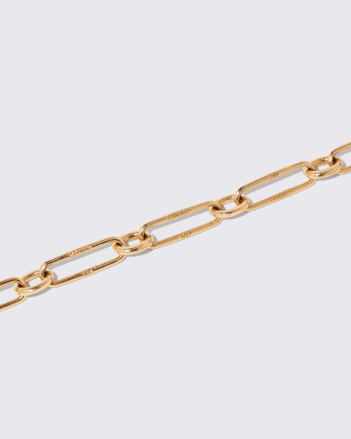 Closeup details of the Link Necklace on light color background.