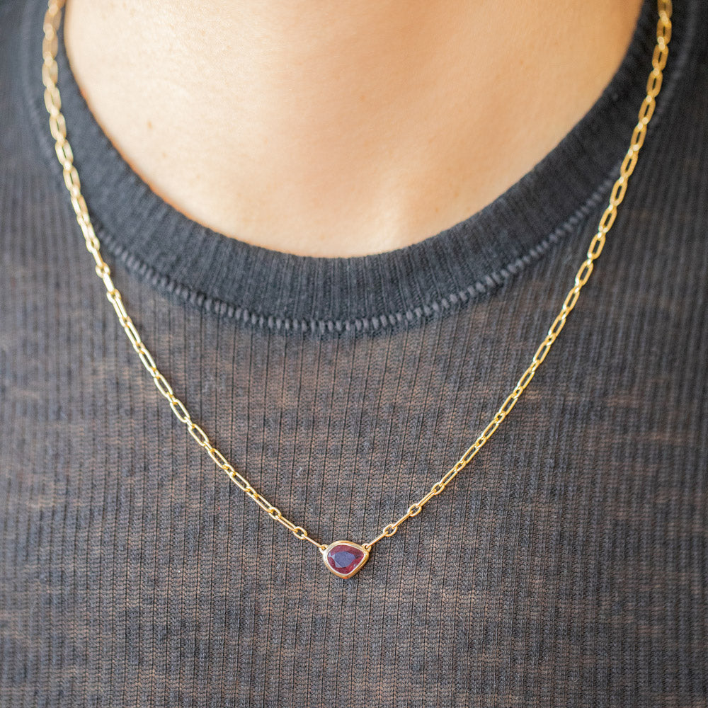 product_details::Pink Sapphire Gusher Necklace on model.