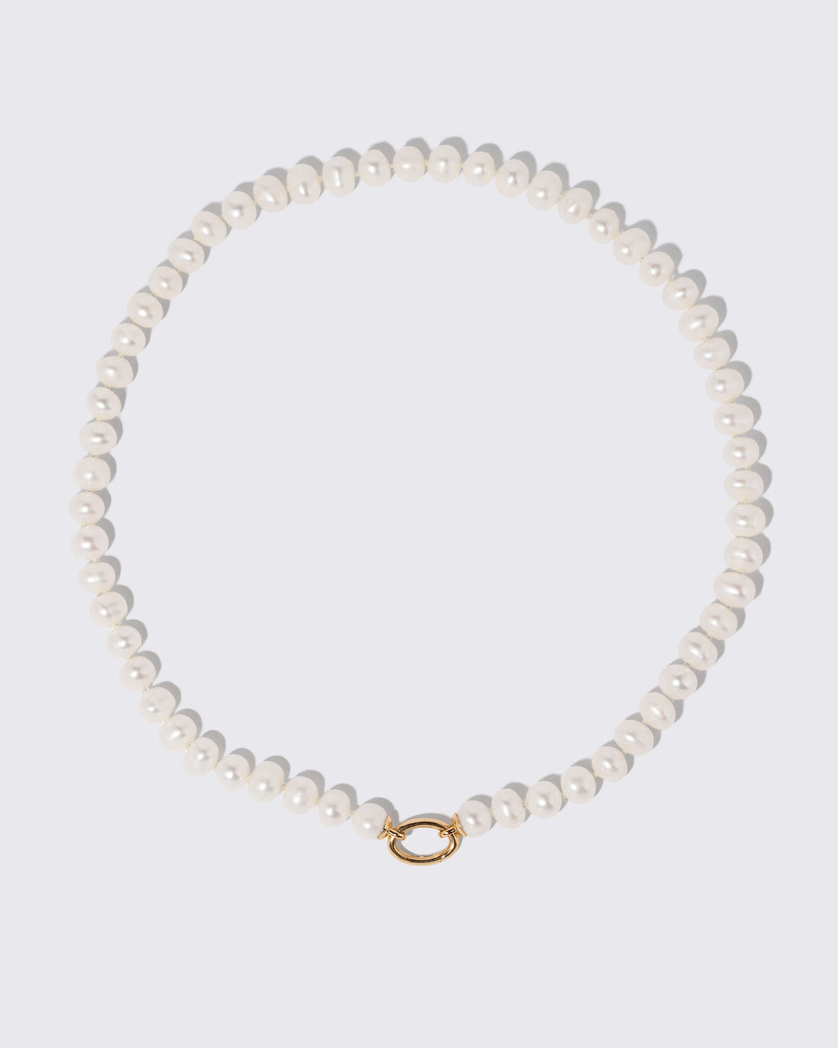 Platinum Pearl Openable Link Necklace and Gold Pearl Openable Link Necklace on light color background.