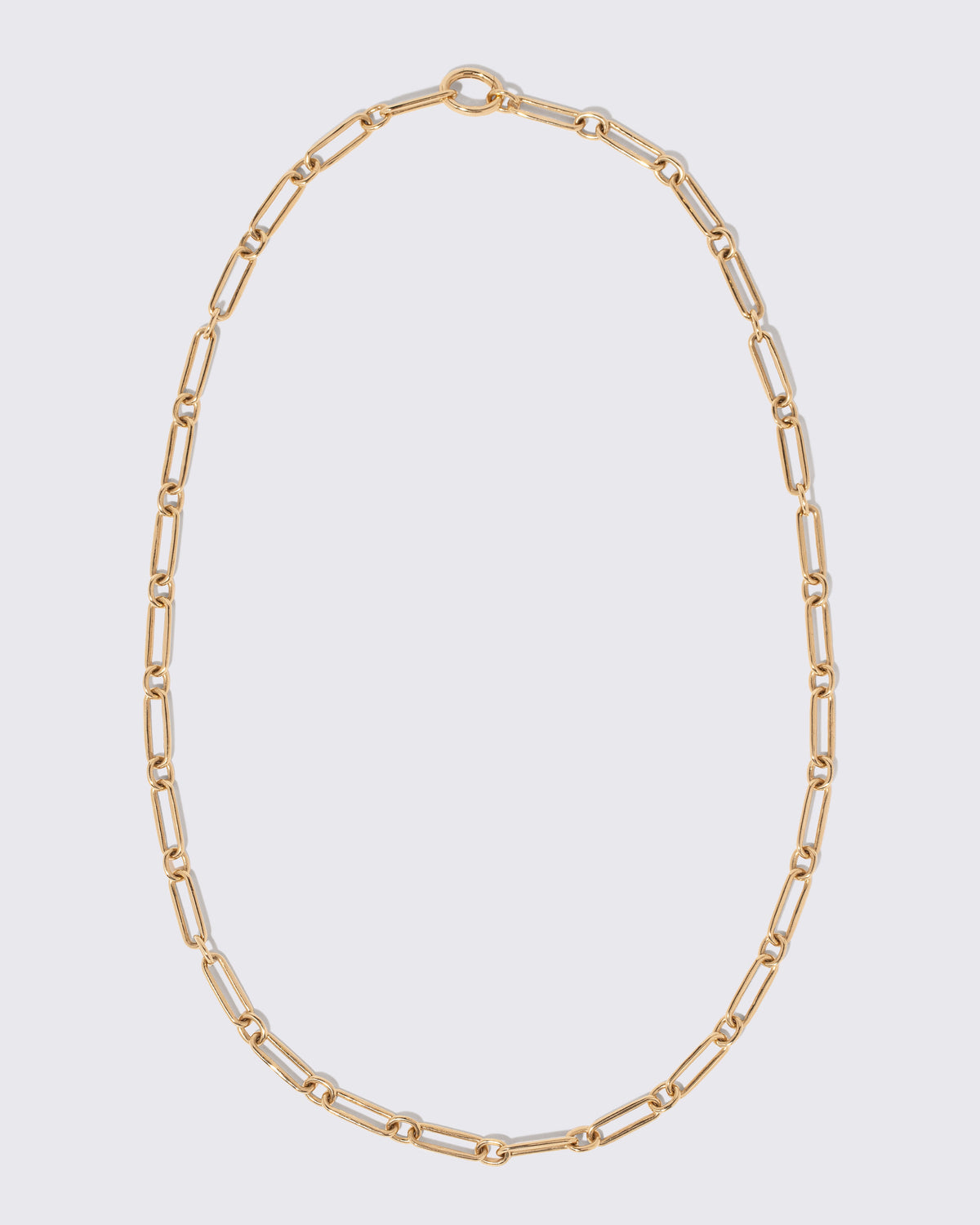 Petite Link Necklace on light color background.