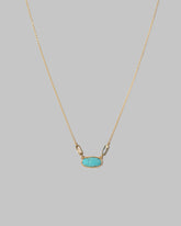 Closeup details of the Thar Necklace on light color background.