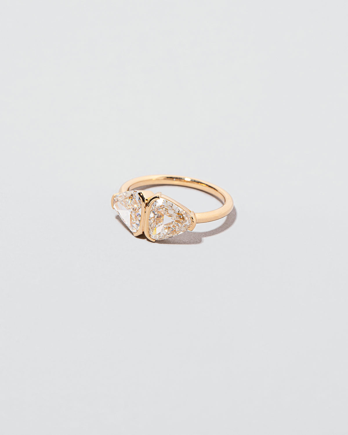 View from the side of the First & Last Ring on light color background.