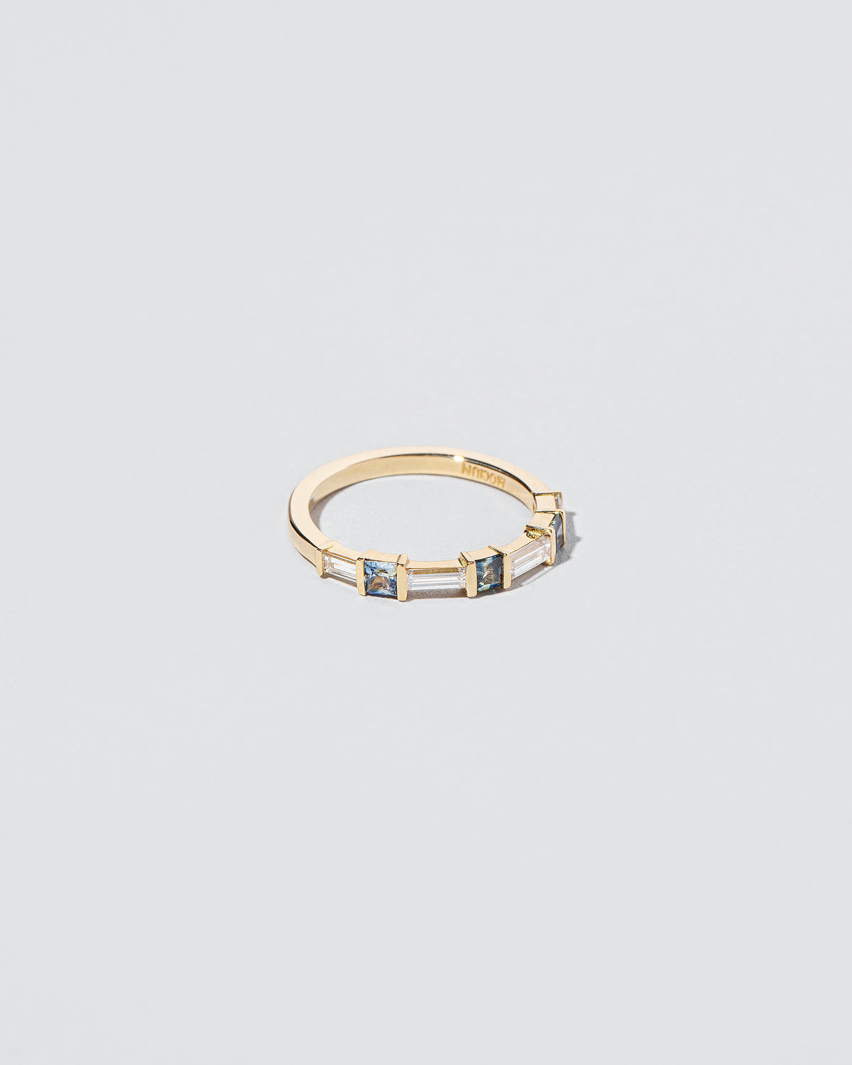 View from the side of the Wayfarer Band on light color background.