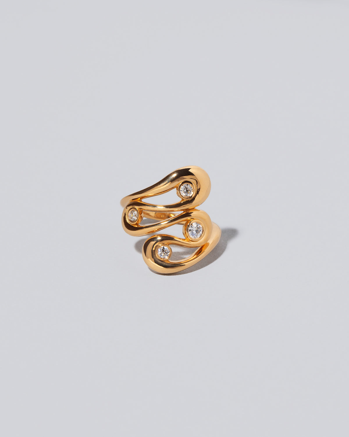 Swivel It Ring on light color background.