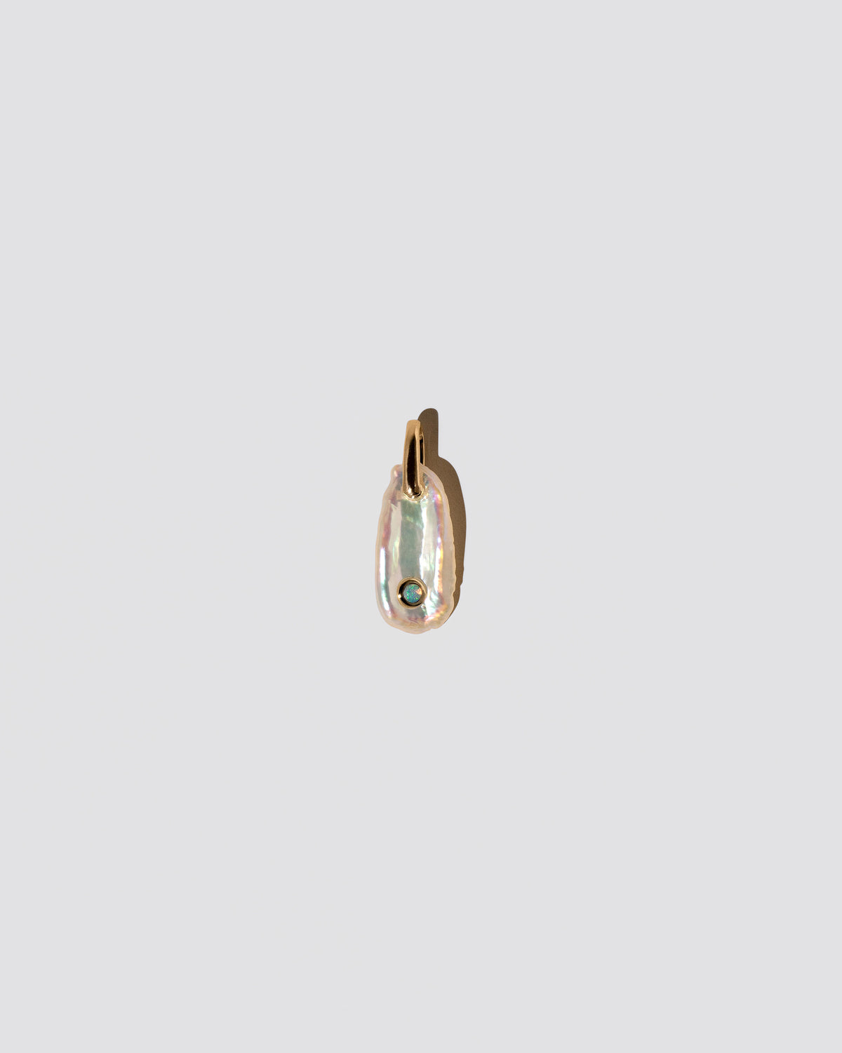 October Birthstone Pearl Pendant With Opal on light color background.