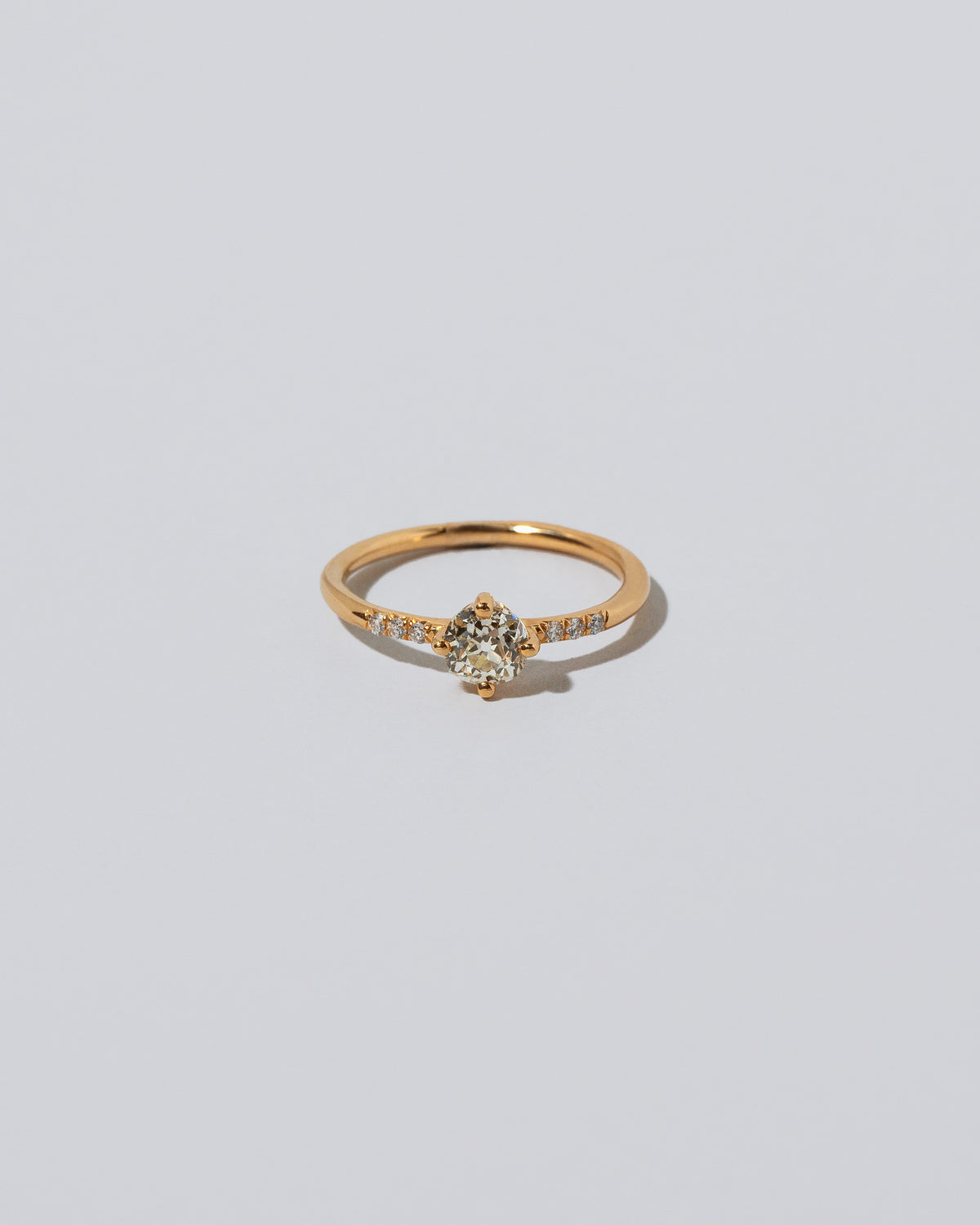 Compass Rose Ring on light color background.