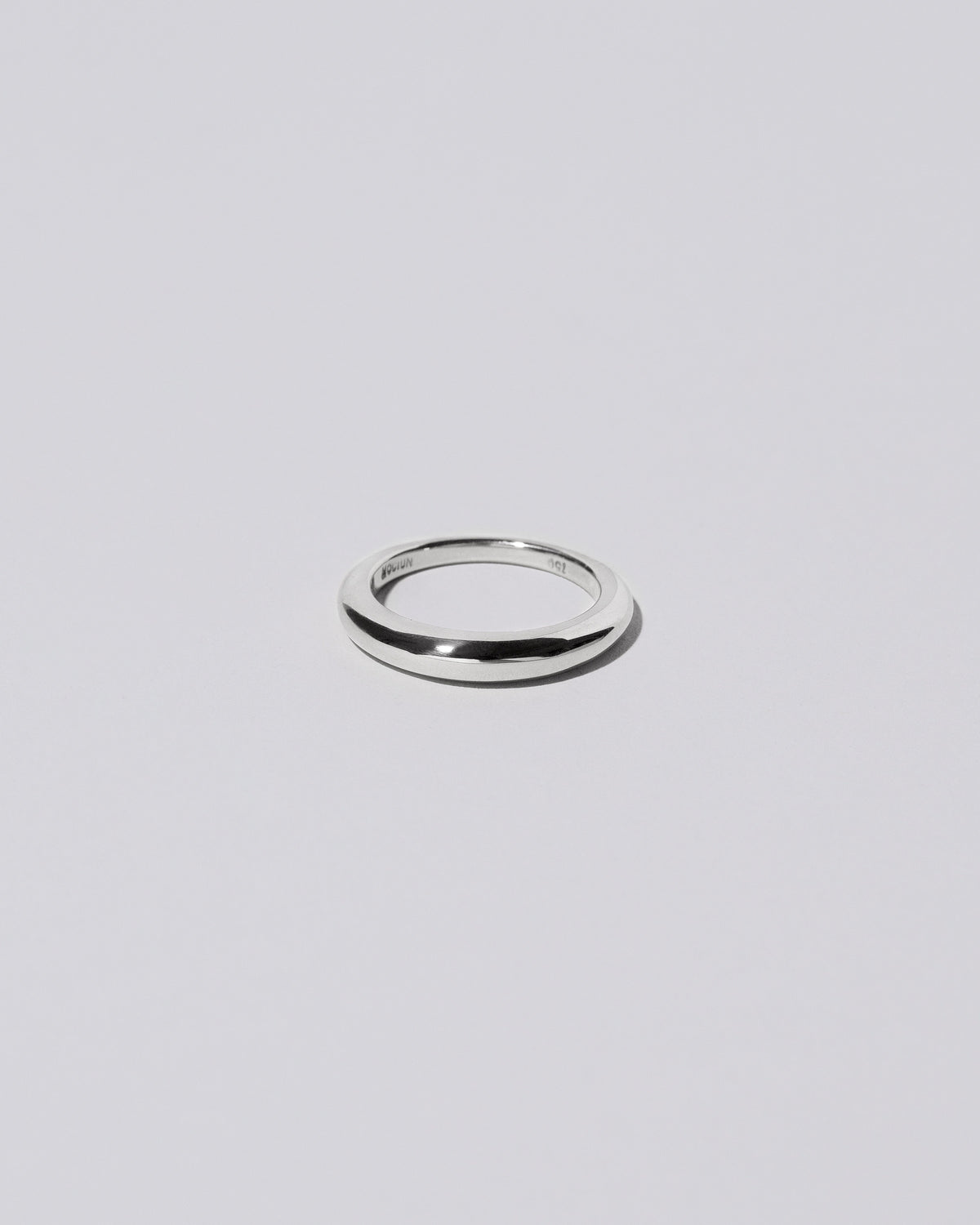 Platinum 3.5mm Venus Band on light color background.