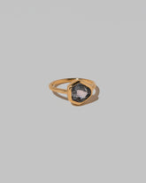 View from the side of the Geyser Purple Sapphire Ring 003 on light color background.