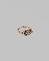 View from the side of the Nemesia Ring on light color background.