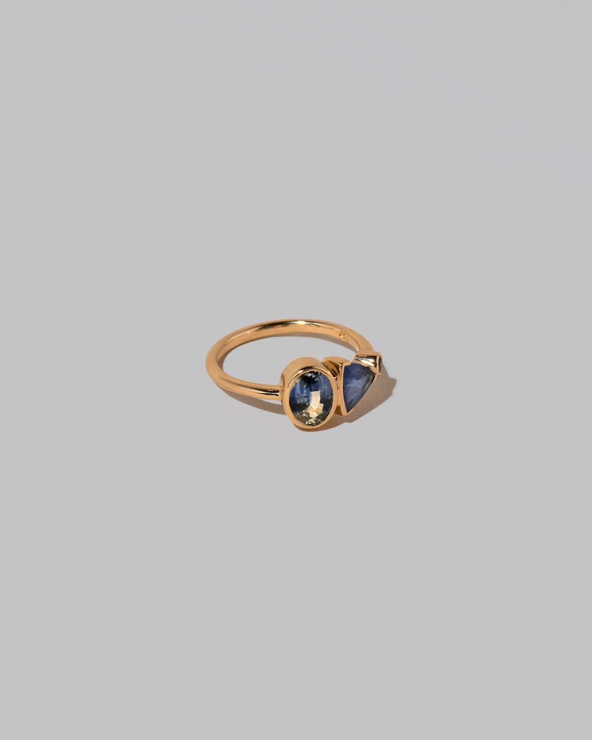 View from the side of the Nemesia Ring on light color background.