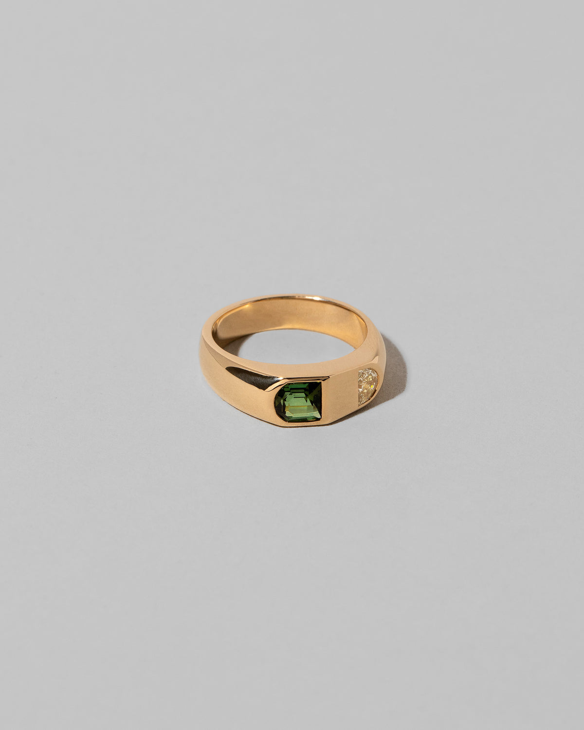 View from the side of the Archway Ring on light color background.