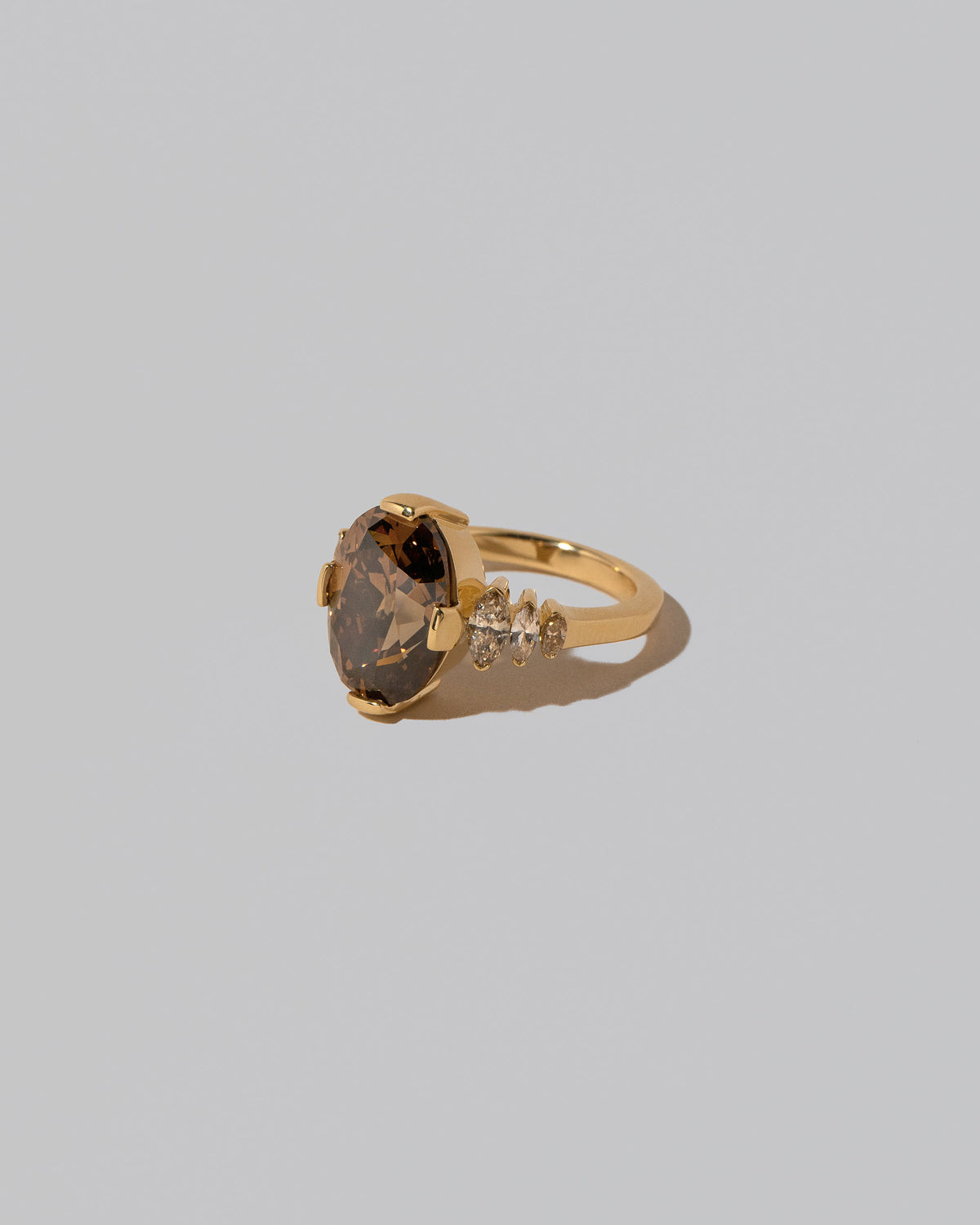 View from the side of the Calycanthus Ring on light color background.
