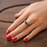 product_details::Delphinium Ring on model.