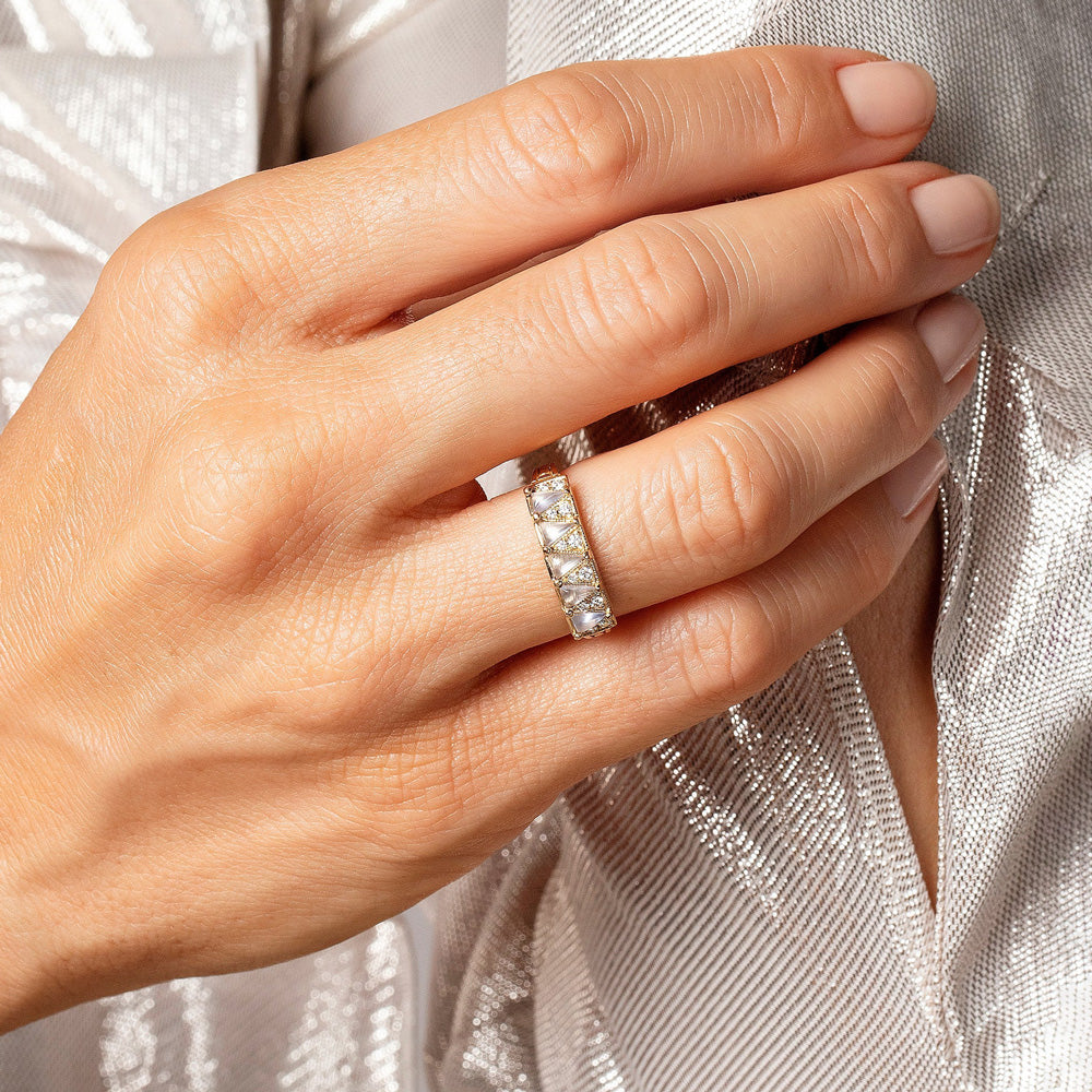 product_details::Gold Blue Chalcedony Five Triangle Ring on model.