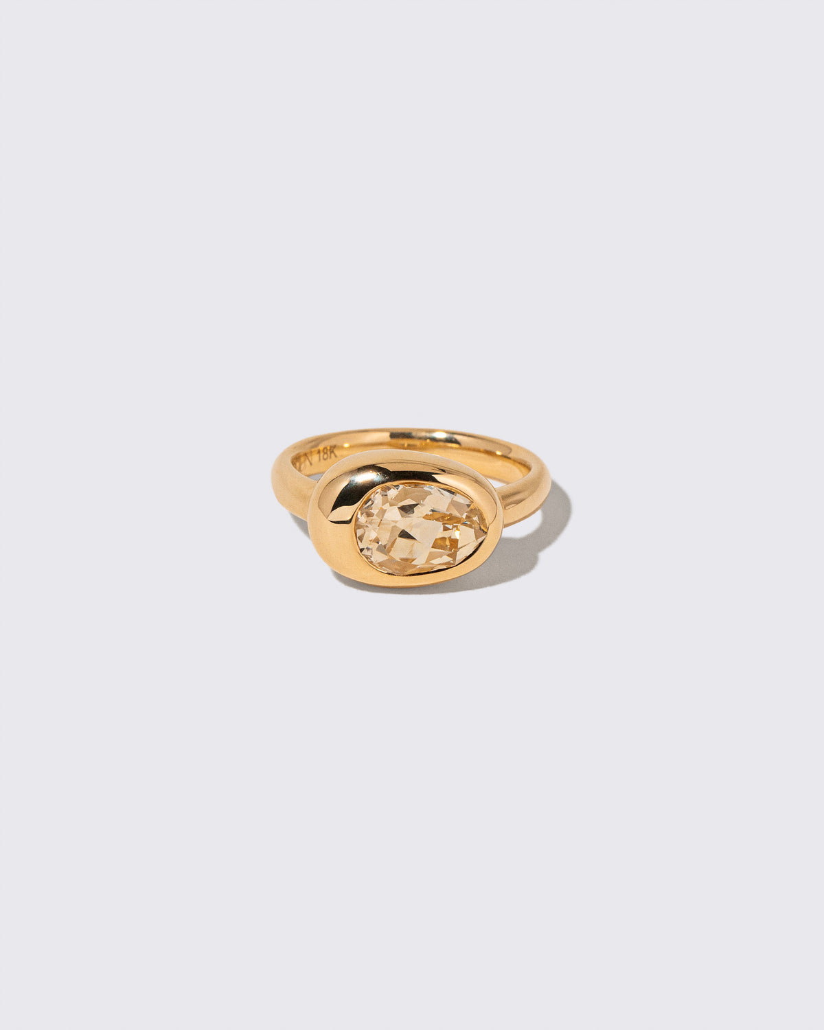 Sapphire Grand Align Ring on light color background.