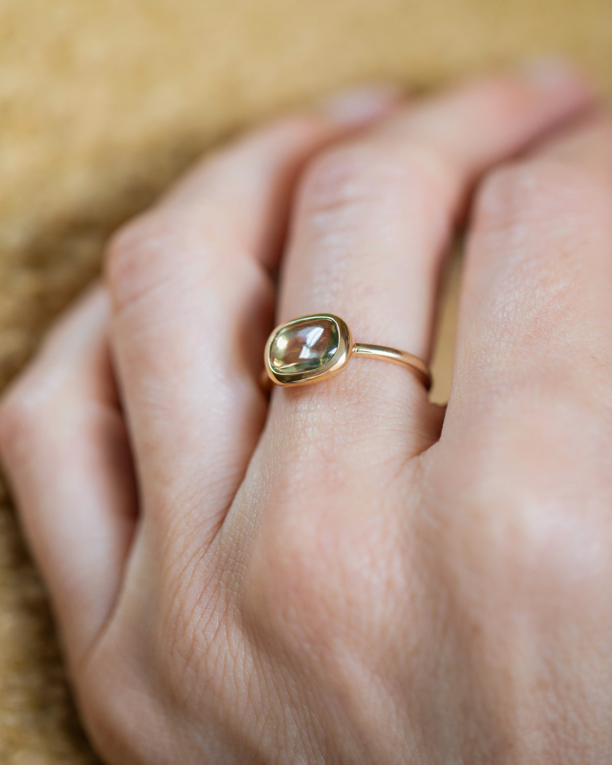 Green Sapphire Gusher Ring on model.
