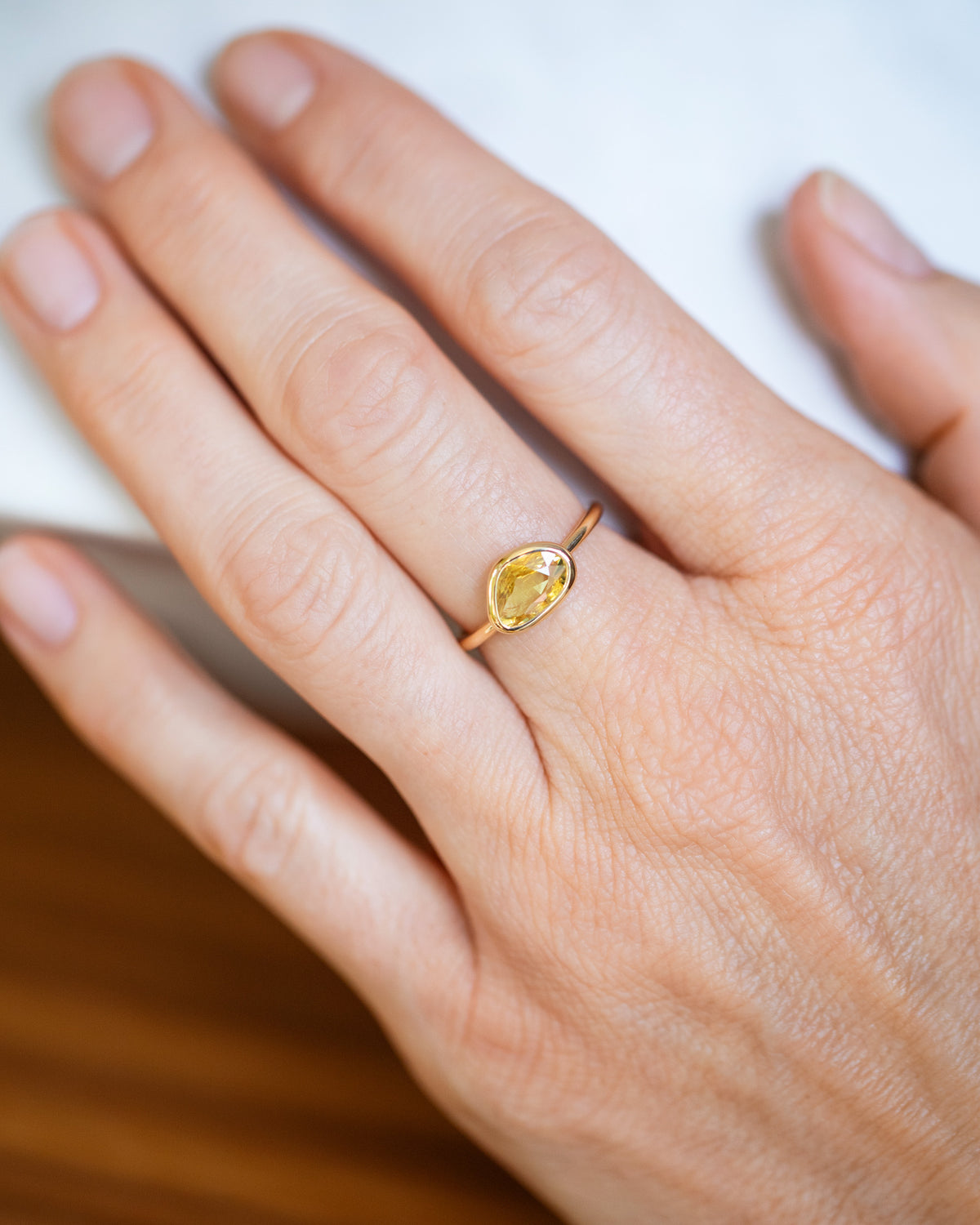 Yellow Sapphire Gusher Ring on model.