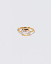 Cushion Diamond Gusher Ring on light color background.