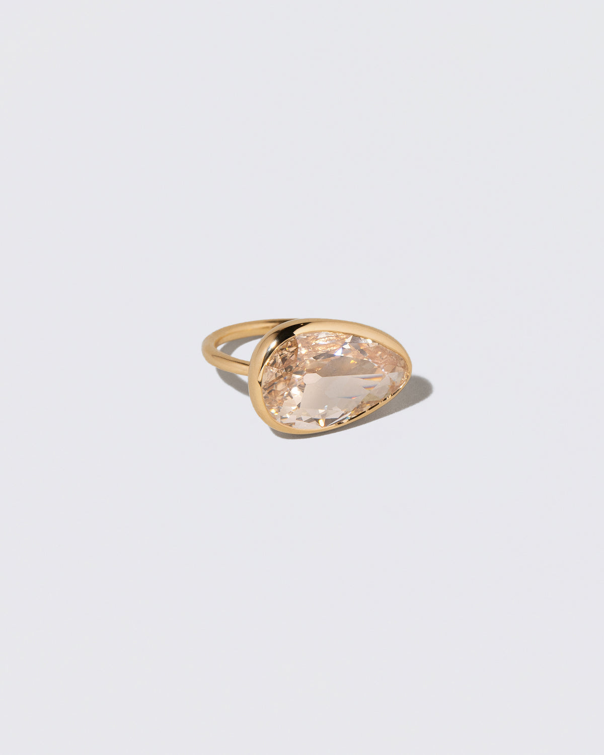 View from the side of the Gusher Diamond Ring 009 on light color background.