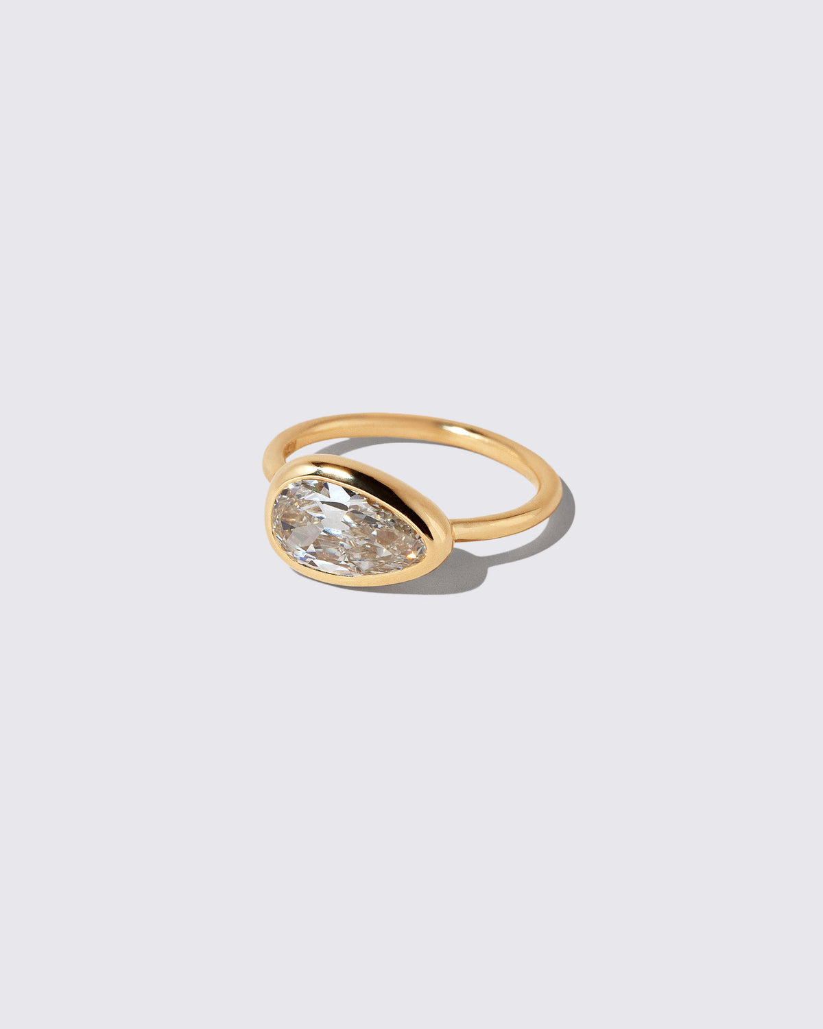 View from the side of the Gusher Diamond Ring 041 on light color background.
