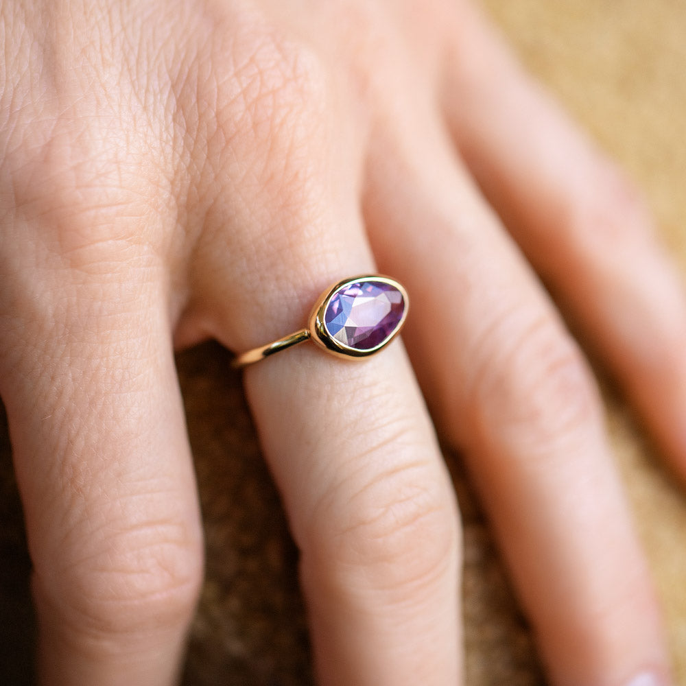 product_details::Gusher Pink Sapphire Ring 053 on model.