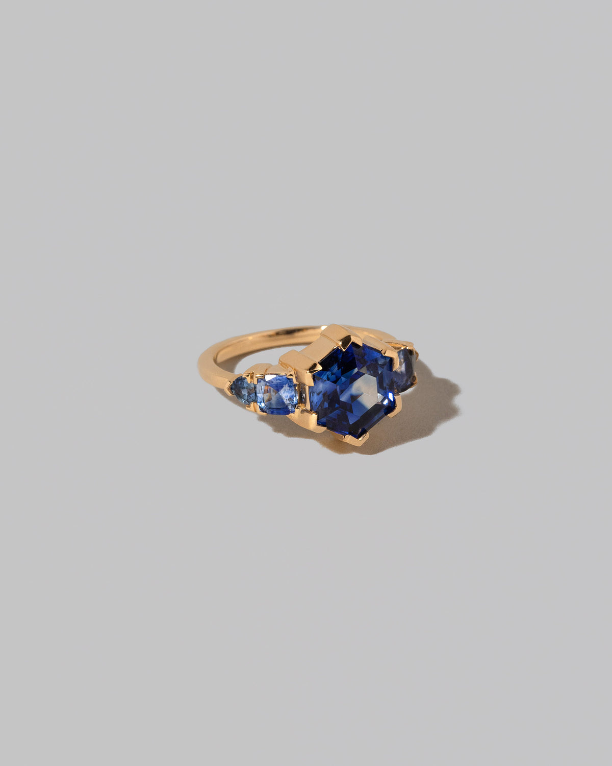 View from the side of the Hyacinthella Ring on light color background.