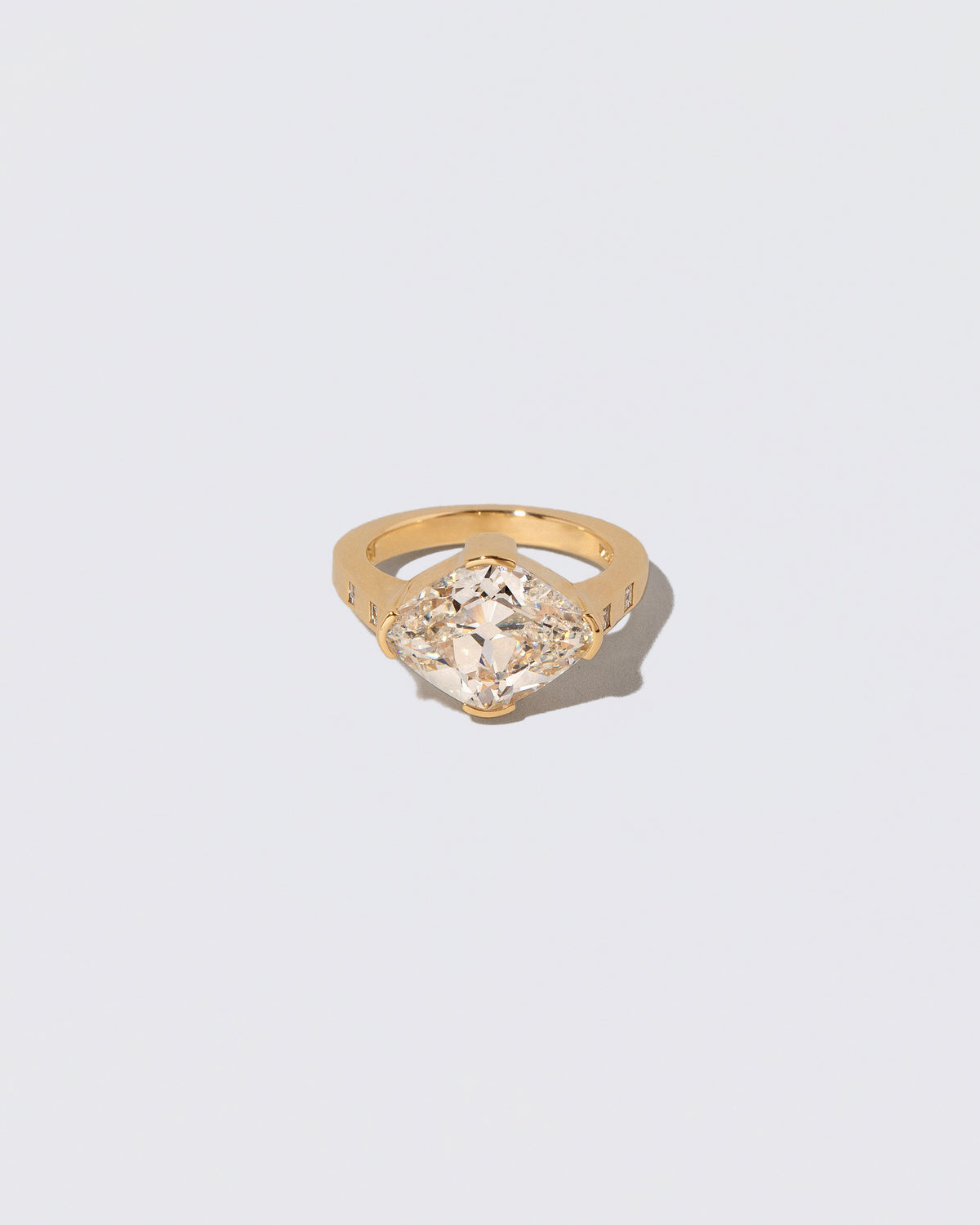 Narcissus Ring on light color background.