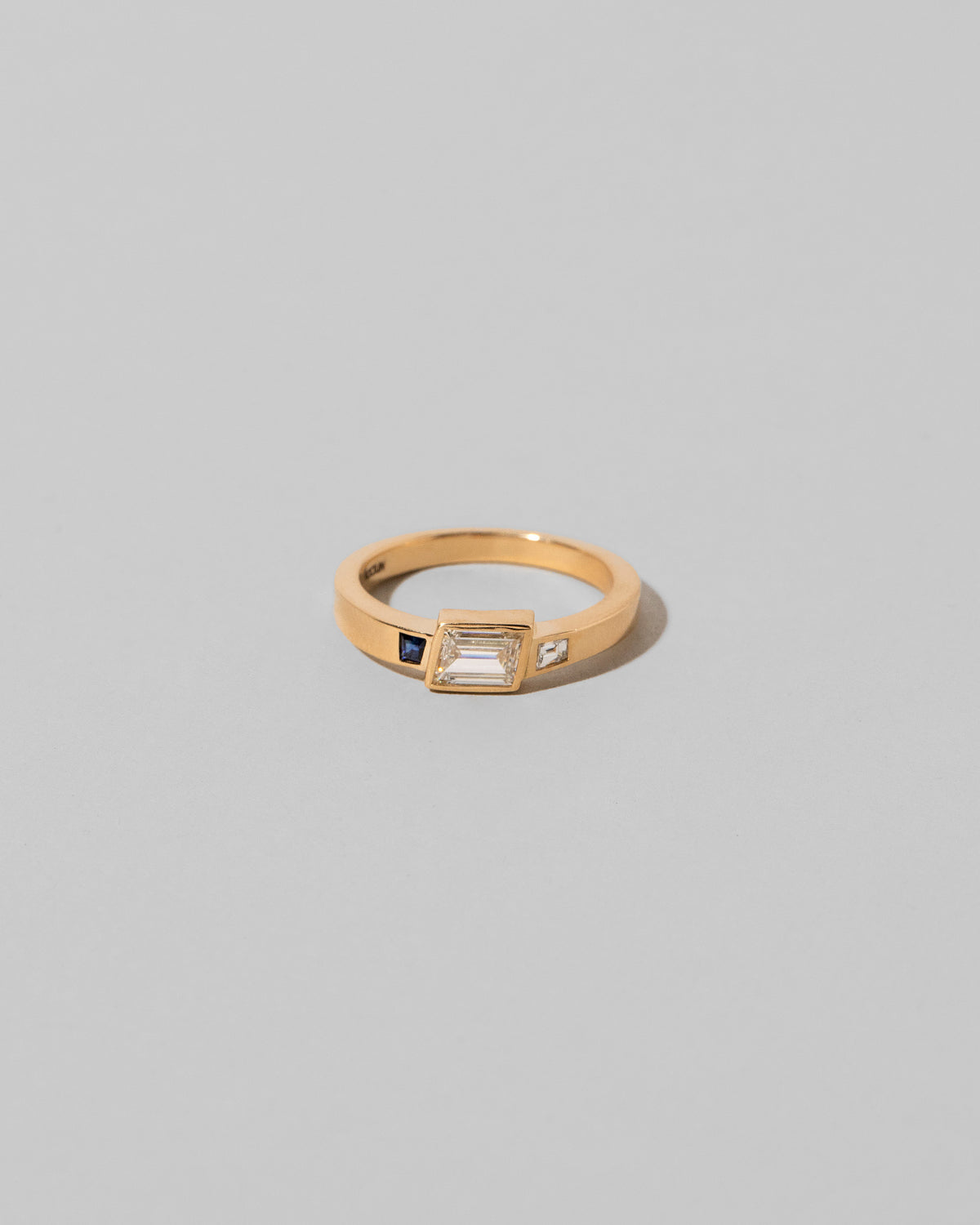 This Way Ring on light color background.