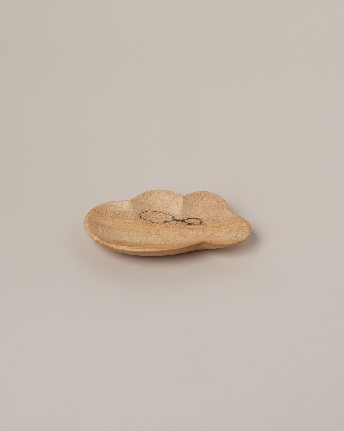 Namu Home Goods Eight Cloud Plate on light color background.
