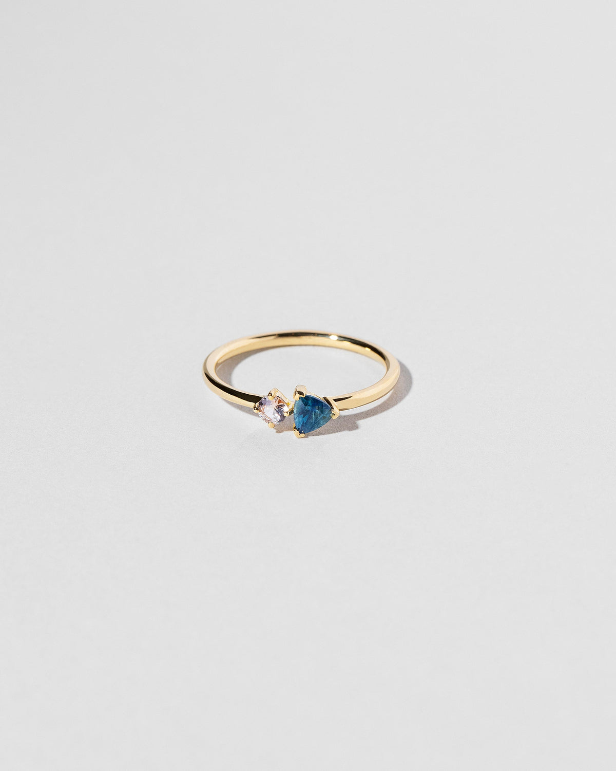 Persephone Ring on light color background.