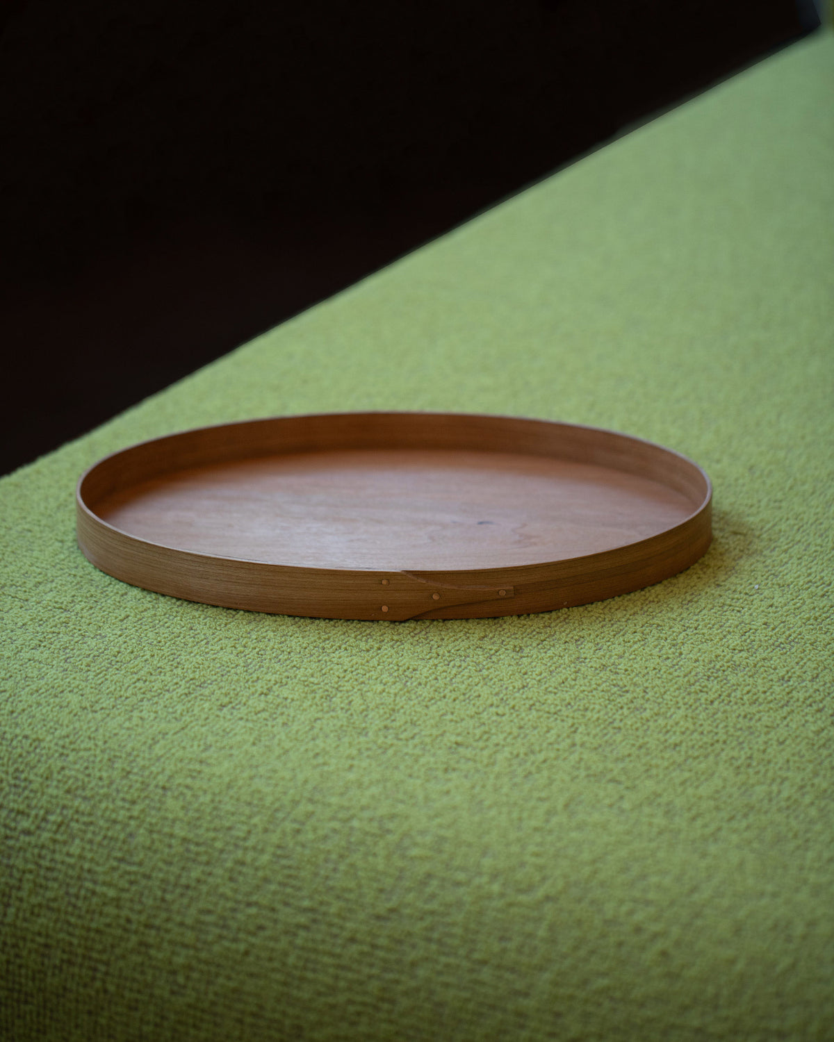 Rikke Falkow Small Cherry Wood Serving Tray on light color background.