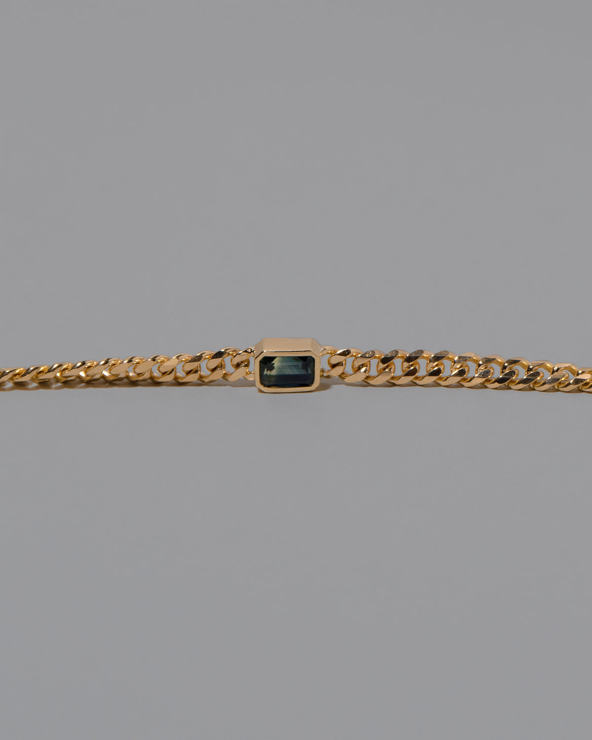 Closeup details of the Attachment Bracelet on light color background.