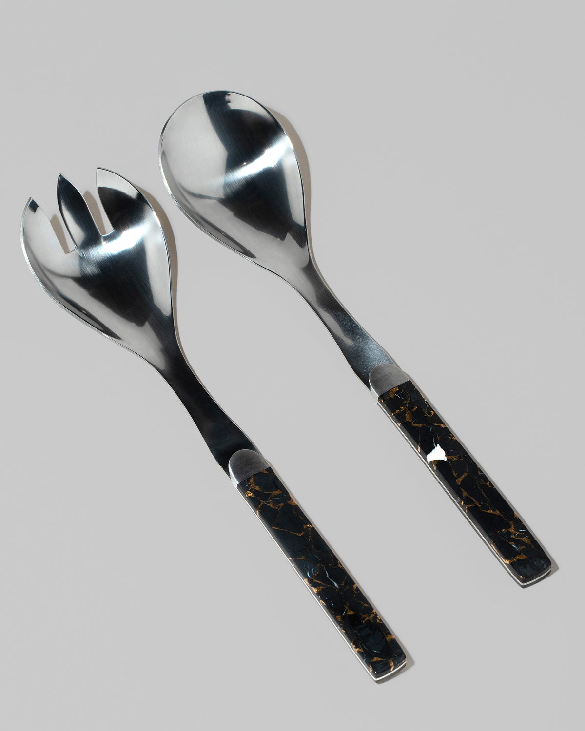 Santa Fe Stoneworks Black Buffalo Turquoise Salad Serving Set on light color background.