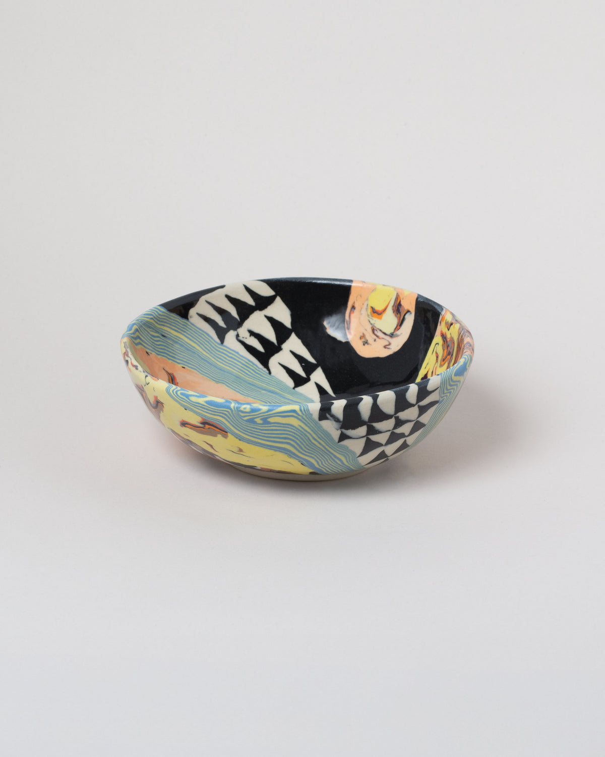 Slush Club Small Nerikomi Bowl No. 101 on light color background.