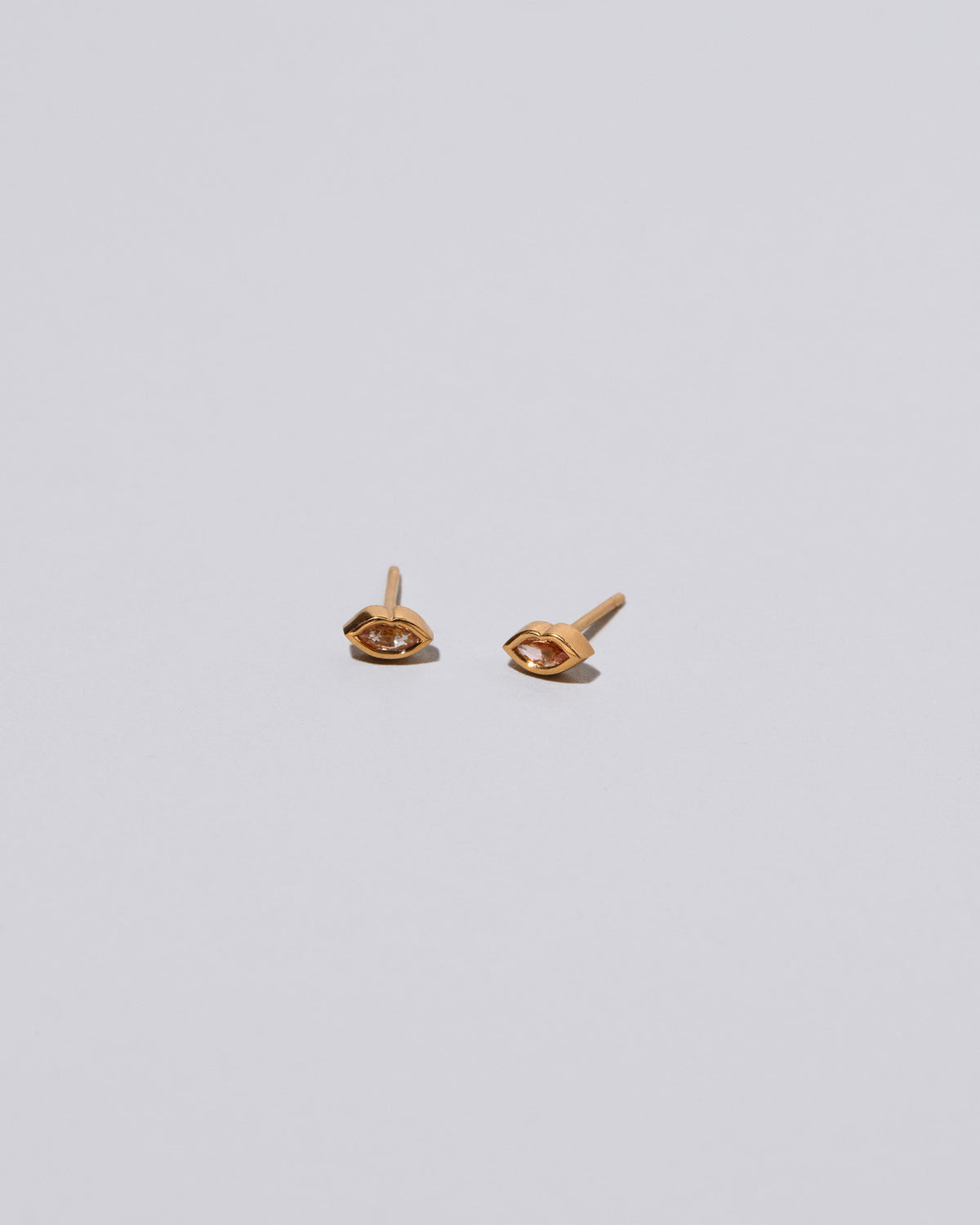 Surprise Me Light Pink Sweet Little Kiss Stud Earrings on light color background.
